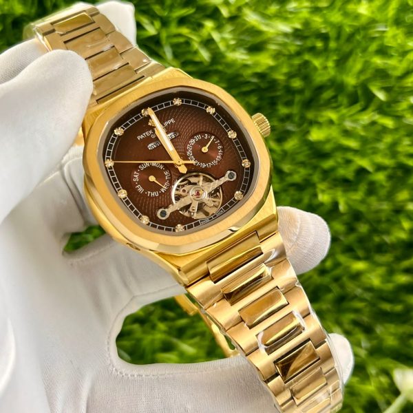 Patek Philippe Gold with case