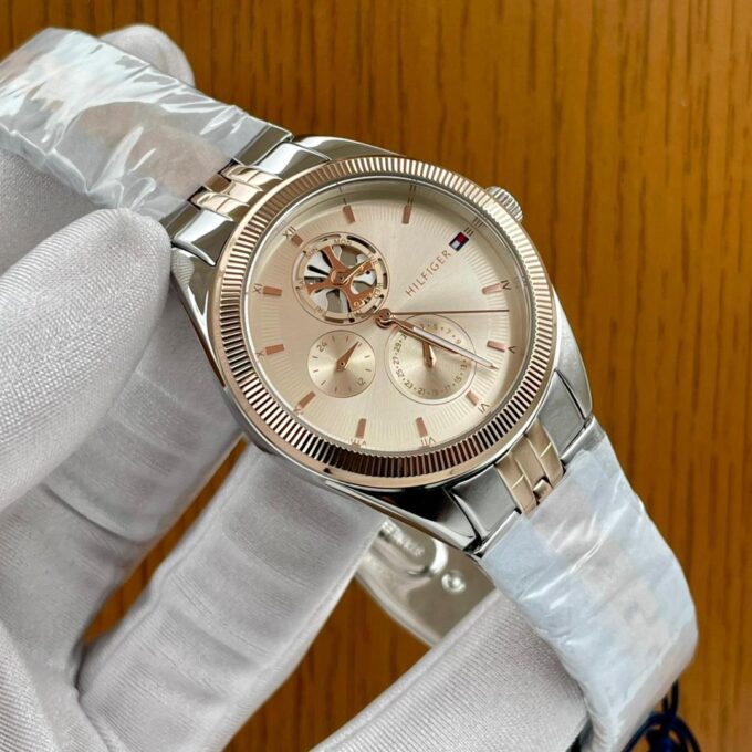 Gold  And Silver Tommy Hilfiger female chain watch with case